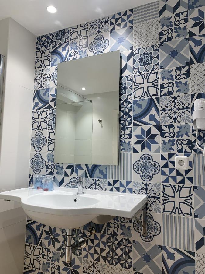 Hostal Hpc Porto Colom Buitenkant foto