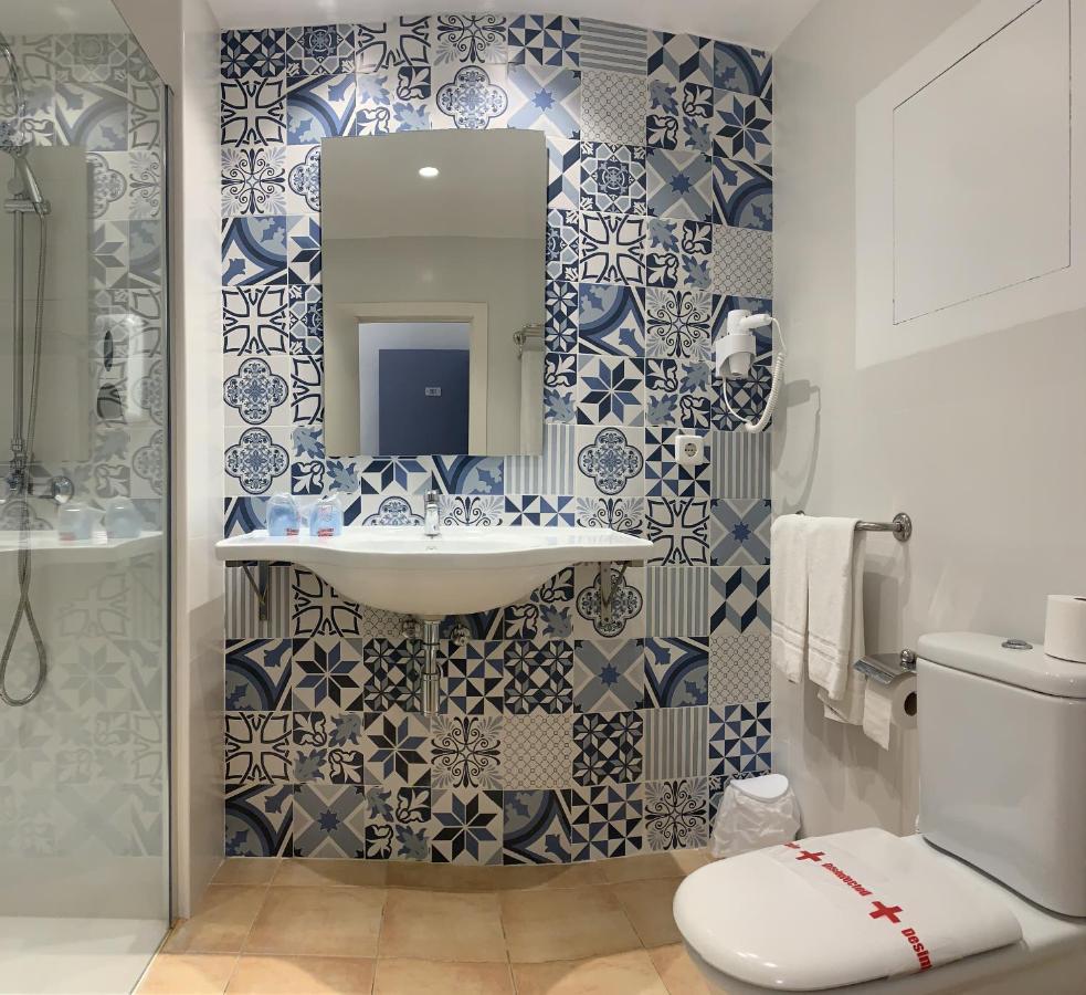 Hostal Hpc Porto Colom Buitenkant foto